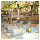 Кислородно-флюсовая резка горячих слябов с использованием автоматизации